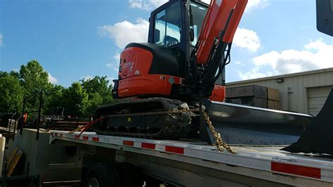 how do i ship a mini excavator|transporting an excavator.